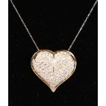 A VERY SUBSTANTIAL 18CT GOLD AND DIAMOND HEART SHAPED PENDANT ON CHAIN.