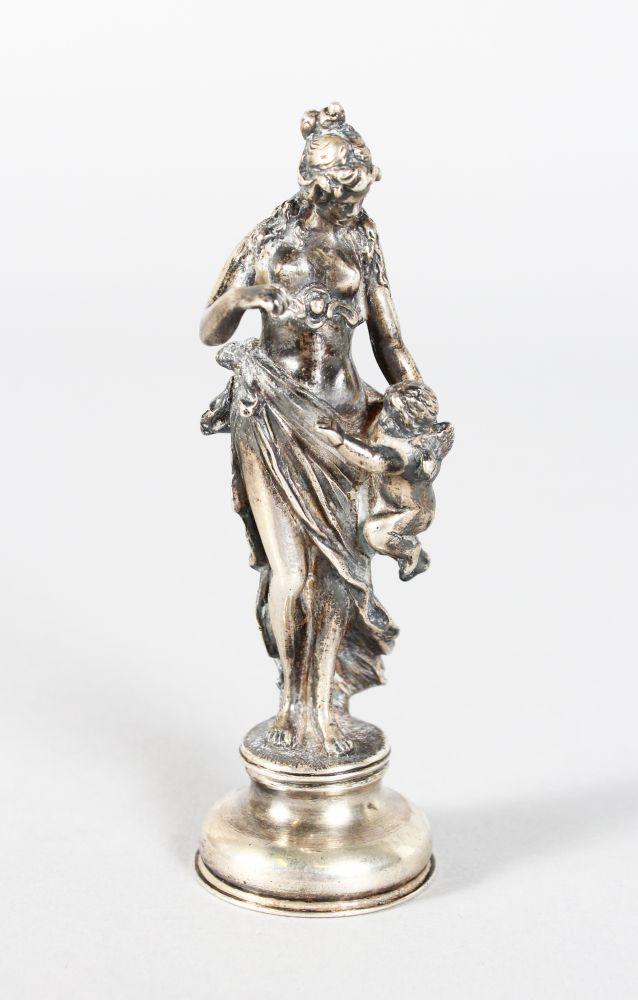 A FRENCH SILVER DESK SEAL, classical female with cupid. Stamped .930. 4ins high.