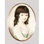 A GOOD 18TH CENTURY OVAL MINIATURE OF A YOUNG GIRL, her hair in ringlets. 4cms x 3cms in a gold