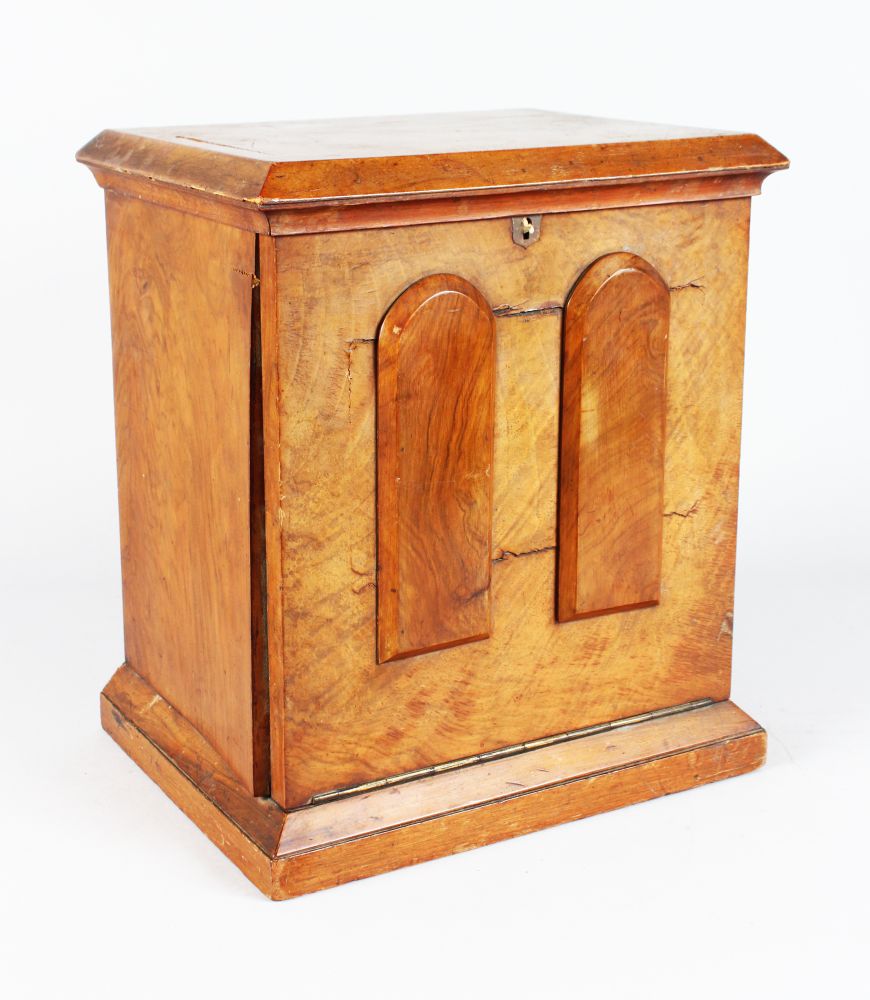 A VICTORIAN WALNUT DROP FRONT STATIONERY BOX with fitted interior. 13ins high.