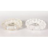 A GOOD PAIR OF LALIQUE ASHTRAYS with beaded decoration. Etched Lalique, France. 7ins diameter.