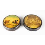 TWO CIRCULAR SNUFF BOXES, the lids with scenes of figures. 8.5cms diameter.