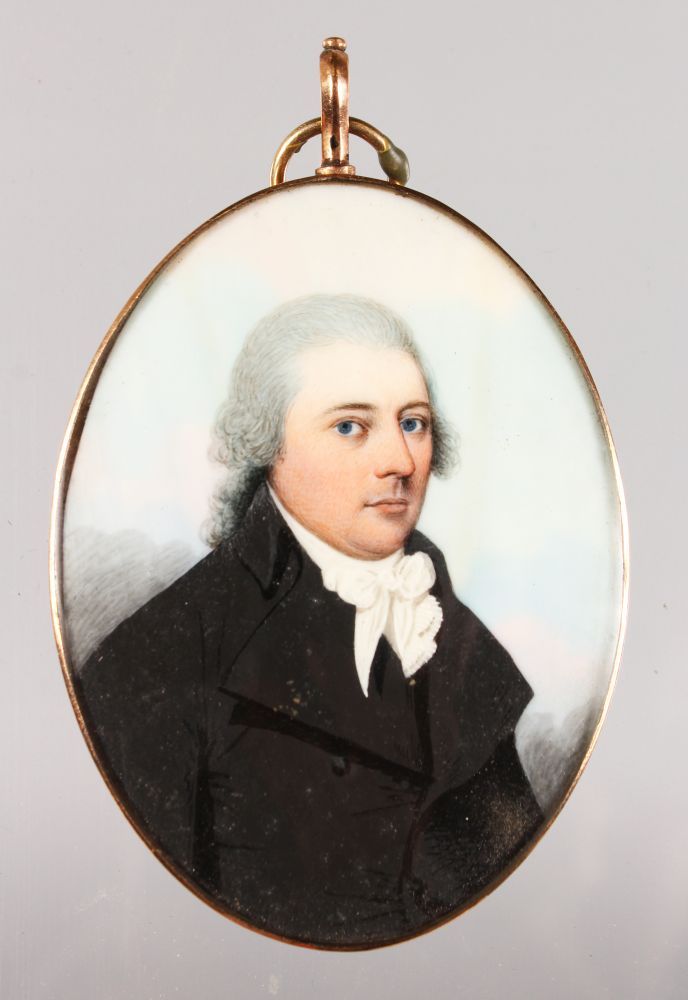 FREDERICK BUCK (1771-1840) BRITISH AN OVAL PORTRAIT MINIATURE OF A GENTLEMAN, wearing a black coat