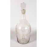 A LARGE ENGRAVED PUNCH DECANTER AND STOPPER, engraved PUNCH with urn, scrolls and fruiting vines.