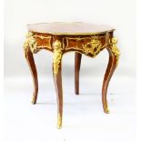 A LOUIS XVI STYLE KINGSWOOD AND ORMOLU INLAID CENTRE TABLE, the shaped top supported on cabriole