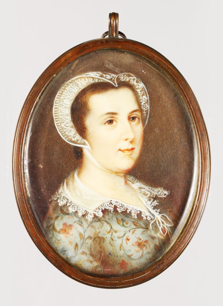 A 19TH CENTURY OVAL PORTRAIT MINIATURE OF A YOUNG LADY in Tudor type dress with lace bonnet. 8cms