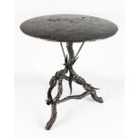 A VICTORIAN PAINTED SLATE CIRCULAR GAMES TABLE, 1ft 10ins diameter, on an unusual horn base.