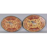 A PAIR OF 20TH CENTURY CHINESE FRAMED OVAL EMBROIDERIES, mainly worked in gilt thread, 17.8in x 13.