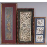 TWO EARLY 20TH CENTURY CHINESE EMBROIDERED SILK SLEEVE PANELS, the frames 23.3in x 10.9in & 26.5in x