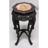 ANOTHER 19TH CENTURY CHINESE MARBLE-TOP HARDWOOD STAND, of octagonal section, the frieze carved