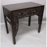 A GOOD 19TH CENTURY CHINESE RECTANGULAR HARDWOOD ALTER TABLE, the pierced frieze carved with