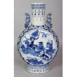 A 19TH CENTURY CHINESE BLUE & WHITE PORCELAIN MOON FLASK, each slightly domed side painted with a
