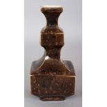 AN UNUSUAL CHINESE BROWN GLAZED SQUARE SECTION PORCELAIN VASE, decorated beneath the glaze with a