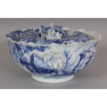 A JAPANESE SETO BLUE & WHITE MOULDED PORCELAIN LOTUS BOWL & COVER, circa 1900, painted with dense