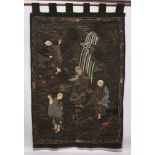 A LARGE EARLY 20TH CENTURY JAPANESE EMBROIDERED WALL HANGING, depicting a group of Sennin near a