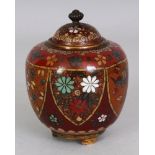 A JAPANESE MEIJI PERIOD CLOISONNE TRIPOD JAR & COVER, decorated in opaque and gilt speckled