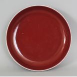 A GOOD QUALITY CHINESE COPPER RED PORCELAIN SAUCER DISH, the base with a six-character Yongzheng