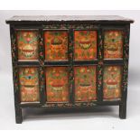 A GOOD & UNUSUAL 19TH CENTURY TIBETAN RECTANGULAR HARDWOOD CABINET, the front with a variety of