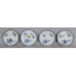 ANOTHER GROUP OF FOUR 18TH CENTURY CHINESE BLUE & WHITE PORCELAIN SAUCERS, each painted with loose