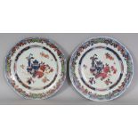 A PAIR OF 18TH CENTURY CHINESE OCTAGONAL PORCELAIN PLATES, each painted in underglaze-blue, iron-