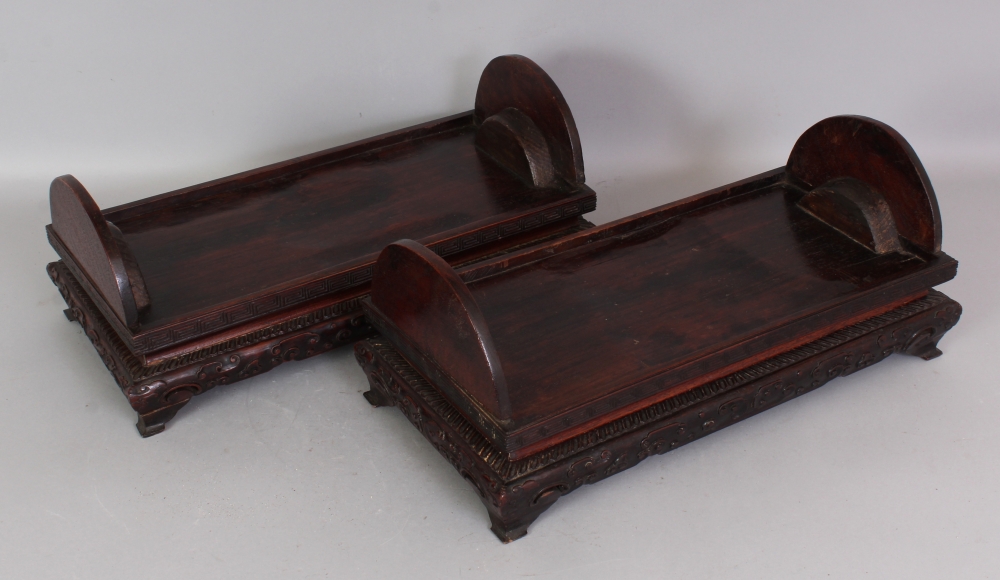 A PAIR OF GOOD QUALITY EARLY 20TH CENTURY CHINESE CARVED RECTANGULAR HARDWOOD STANDS, intended for