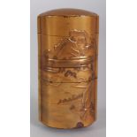 A JAPANESE MEIJI PERIOD FOUR CASE GOLD LACQUER INRO, unsigned, decorated with mountainous river