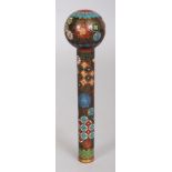 A JAPANESE MEIJI PERIOD CLOISONNE CANE HANDLE, decorated with formal flowerheads and designs, 5.