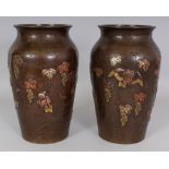 AN UNUSUAL PAIR OF GOOD QUALITY JAPANESE MEIJI PERIOD MIXED METAL VASES, each decorated with an