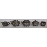 A GROUP OF 19TH/20TH CENTURY CHINESE PEWTER CLAD YIXING POTTERY TEA WARES, comprising three