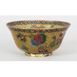 A PLIQUE-A-JOUR STYLE BOWL, decorated with flowers and leafage on a translucent yellow ground, 4.4in