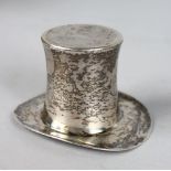 A CARTIER SILVER TOP HAT. 2ins high.