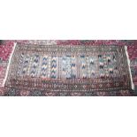 AN UNUSUAL PERSIAN RUNNER with horizontal motifs within a border with gulls. 7ft 9ins x 3ft.