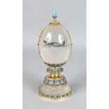 A SUPERB RUSSIAN SILVER, ENAMEL AND ROCK CRYSTAL EGG. 9.5ins high.