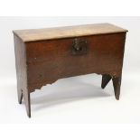 A 17TH CENTURY ELM LONG COFFER with plain plank construction on high legs. 2ft 11ins long.