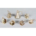 SIX PLATED ANIMAL AND BIRD PLACE NAME HOLDERS and a candle snuffer (7).