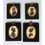 FOUR VARIOUS FRAMED SILHOUETTES, a gentleman and three ladies.