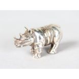 A SILVER MINIATURE RHINO.