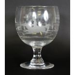 A LARGE GOBLET engraved with a fox hunting scene. 8.5ins high, 5.5ins diameter.