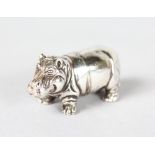 A SILVER MINIATURE HIPPO.