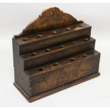 AN 18TH CENTURY OAK AND ELM THREE TIER SPOON RACK. 1ft 4ins wide, 1ft 2ins high.