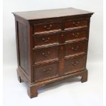 A GOOD 18TH CENTURY OAK STRAIGHT FRONT CHEST of two single and three long graduated drawers with