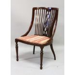 A VICTORIAN MAHOANY NURSING CHAIR with railed back and padded seat.