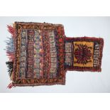 A SMALL PERSIAN RUG. 1ft 8ins x 1ft 3ins.