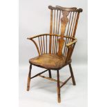 AN 18TH CENTURY COMB BACK WINDSOR ARMCHAIR.