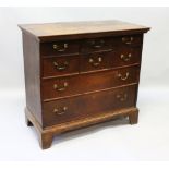 AN 18TH CENTURY OAK STRAIGHT FRONT CHEST of SIX SMALL DRAWERS AND TWO LONG DRAWERS with brass