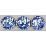 A GROUP OF THREE GOOD QUALITY CHINESE KANGXI PERIOD BLUE & WHITE PORCELAIN SAUCERS, circa 1700, each