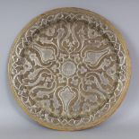 A 20TH CENTURY CAIRO WARE SILVER-METAL INLAID CIRCULAR BRASS DISH, decorated with stylised motifs