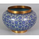 A GOOD QUALITY EARLY 20TH CENTURY CLOISONNE JARDINIERE, the sides decorated with a dense formal