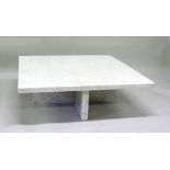 A LARGE GREY ITALIAN MARBLE COFFEE TABLE, the square top on "X" shape supports. 3ft 3ins x 3dr