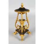 A REGENCY BRONZE AND GILT BRONZE INCENSE BURNER with acorn finial and pierced lid. 9ins high.